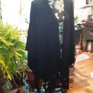 Black , fringed trim along bottom